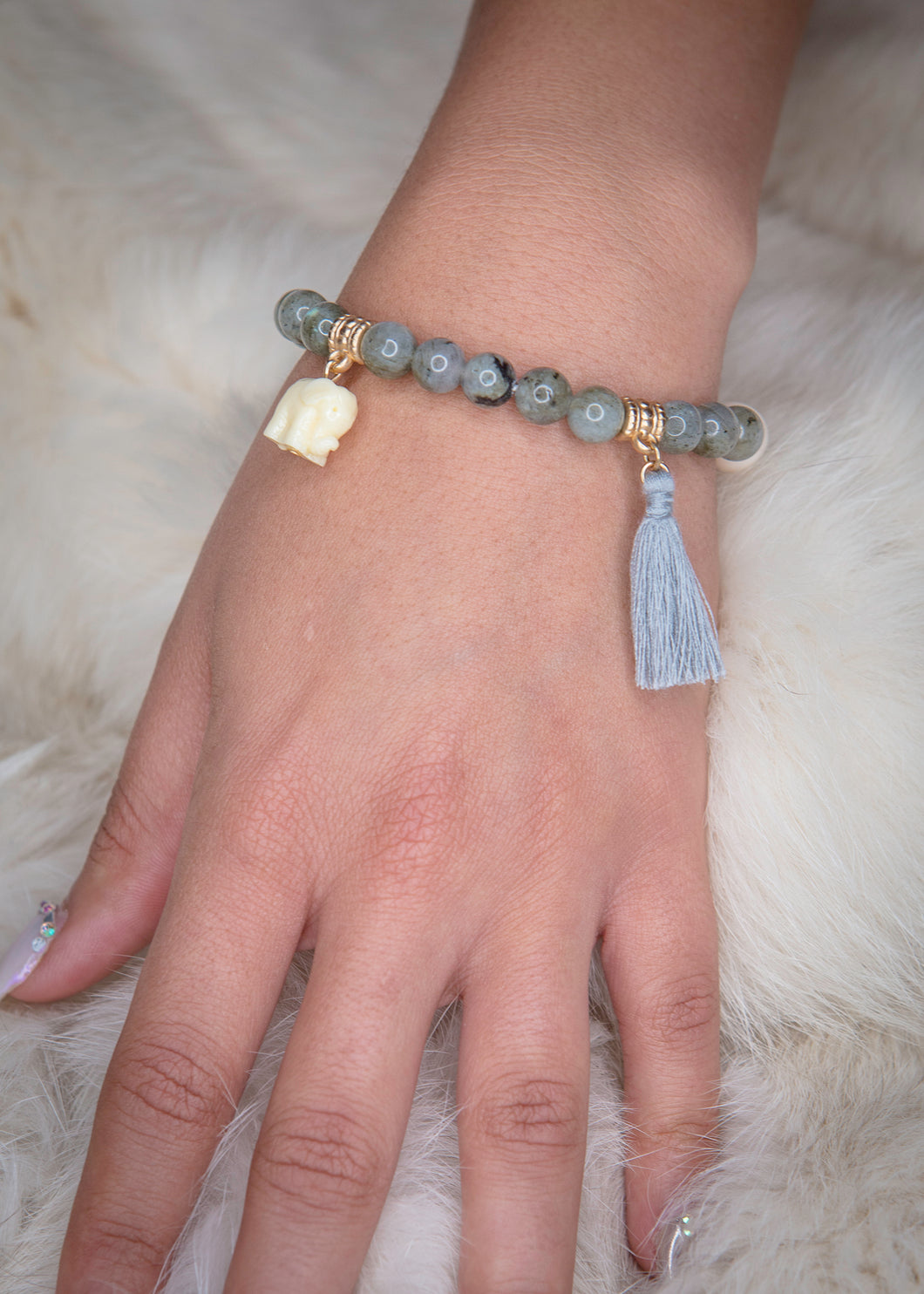 Stretch Marbleized Ivory Elephant Tassel